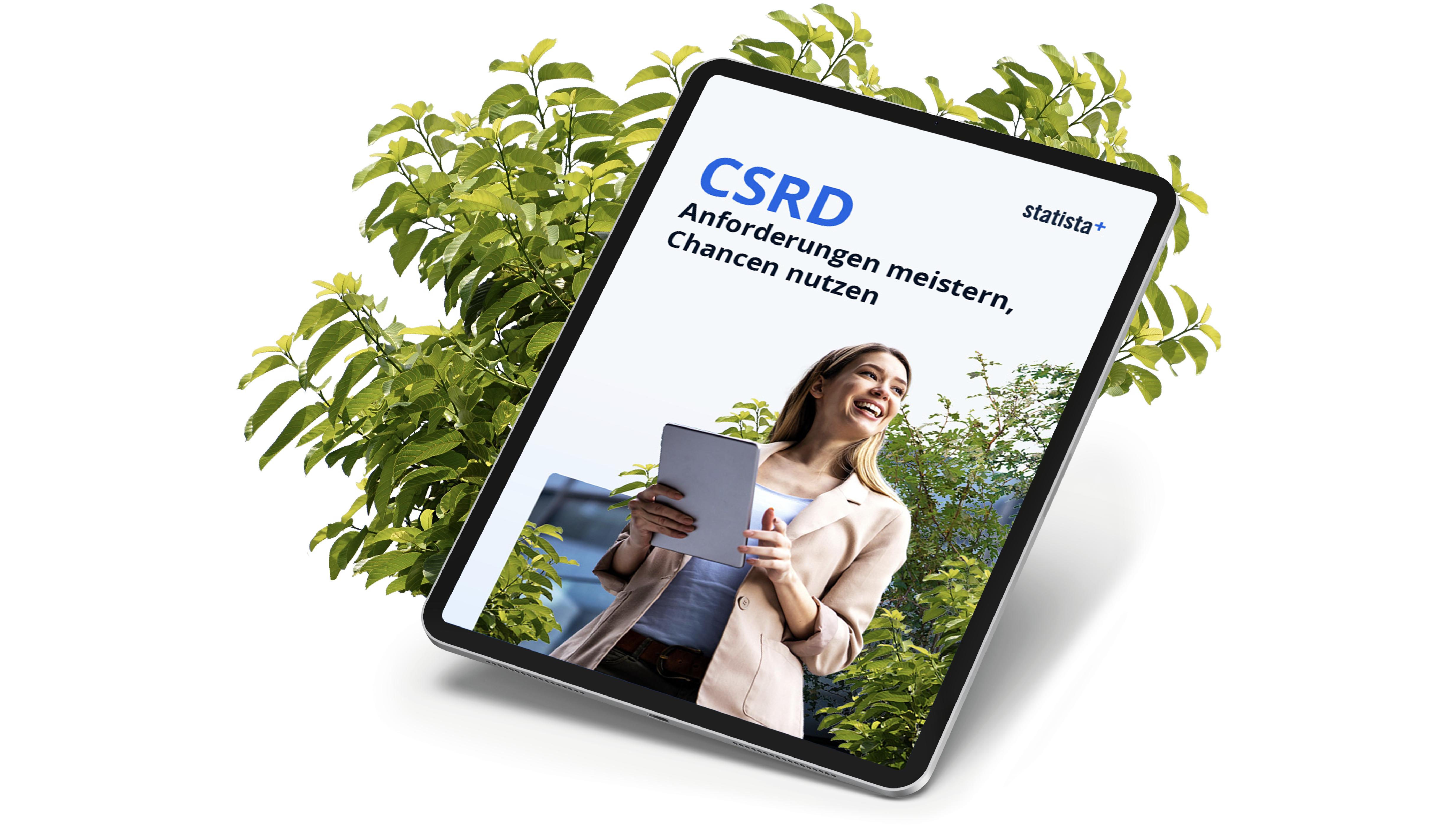 A digital tablet displaying the cover of the CSRD Whitepaper, featuring a smiling businesswoman holding a tablet, surrounded by green plants.​